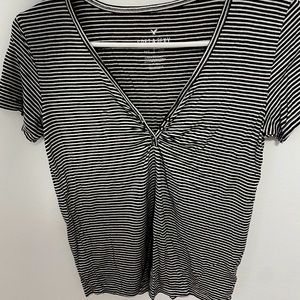 Black and white striped button tee